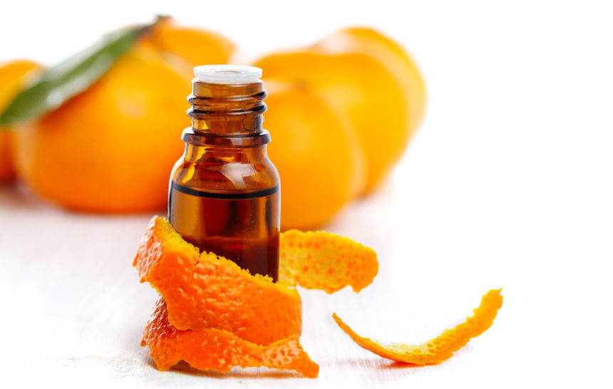 Bottle,Of,Aromatic,Essence,And,Fresh,Orange,On,White,Isolated Sweet Orange Essential Oil
